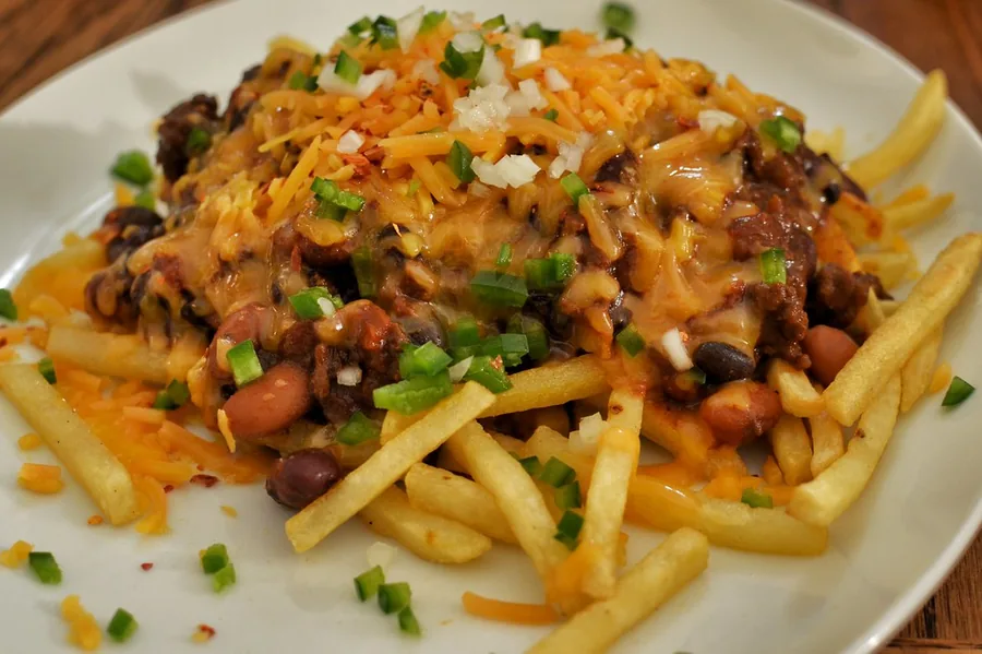 Loaded fries under chilli and cheese